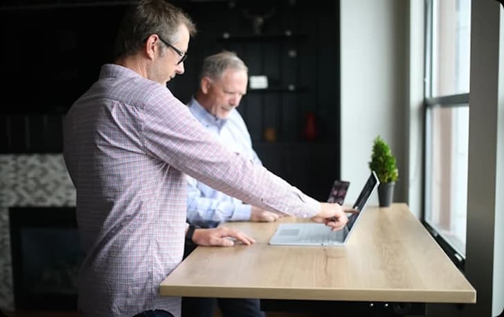 Two people working together